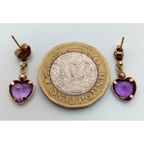 612 - A Pair of 9K Gold and Amethyst Earrings.