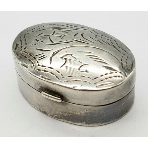 644 - Vintage SILVER PILL BOX. Oval shape with nicely decorated lid. Opens and closes perfectly. Excellent... 