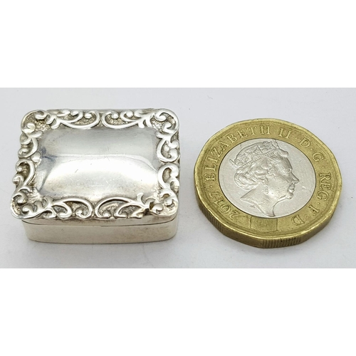 693 - Vintage SILVER PILL BOX with beautiful scroll border to top. Opens and closes perfectly. Full hallma... 