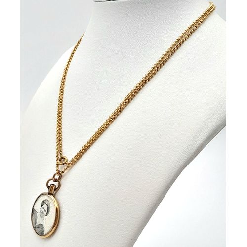 696 - A 9K Gold Picture Pendant on a Gilded Chain.