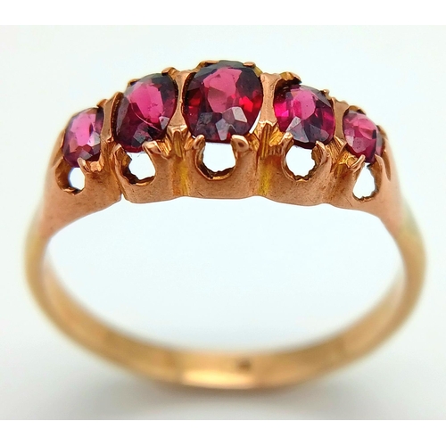 728 - Impressive 9 carat GOLD RING having 5 x RED GEMSTONES oval cut and Mounted to top. Complete with rin... 