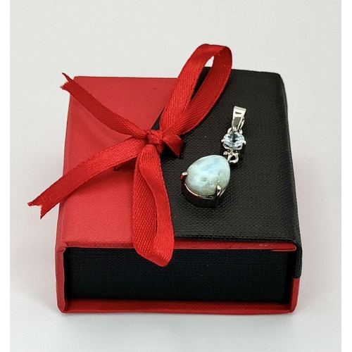 1559 - A 925 Silver Turquoises and Aquamarine Drop Pendant, Weight - 5g, size: 40mm x 11mm. Comes with box.... 