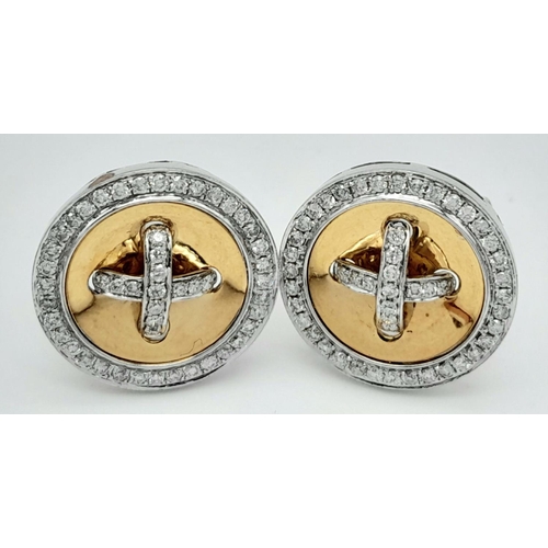 921 - A Pair of 14K White and Yellow Gold Diamond Cufflinks. Circular form with 1ct (2ctw) of decorative d... 