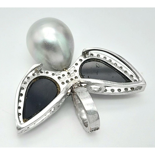 1180 - An Italian Hand-Made 18K White Gold, Diamond and Tahitian Pearl Pendant in a Dove Bird Form. Black o... 