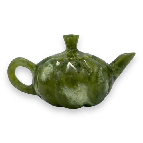 772 - An exquisite Chinese Green Jade Teapot Set. All Hand Crafted from jade, this set features a teapot a... 