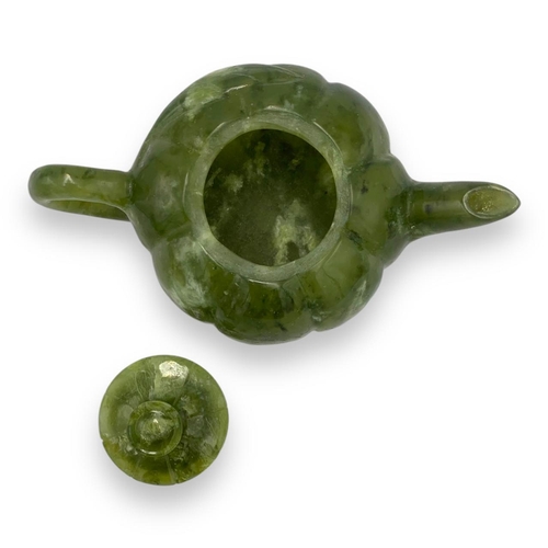 772 - An exquisite Chinese Green Jade Teapot Set. All Hand Crafted from jade, this set features a teapot a... 