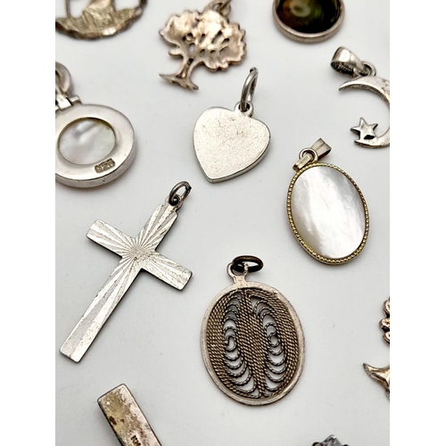 1112 - A Selection of Silver Charms. 45g total weight.