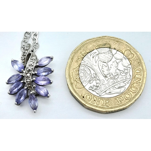 1249 - An Amethyst and Silver Pendant on a White Metal Chain Necklace. 2cm and 42cm.