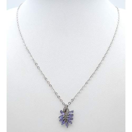 1249 - An Amethyst and Silver Pendant on a White Metal Chain Necklace. 2cm and 42cm.