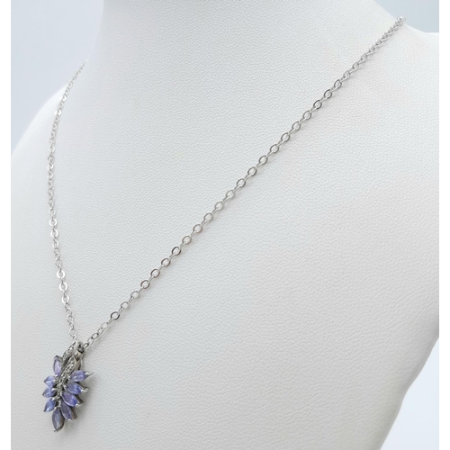 1249 - An Amethyst and Silver Pendant on a White Metal Chain Necklace. 2cm and 42cm.