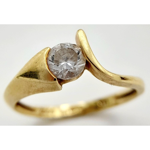 21 - Attractive 14 carat gold ring in modernist crossover style