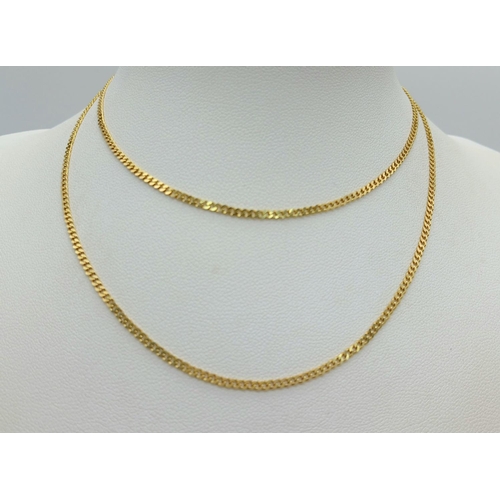 585 - A 9K Yellow Gold Petit Curb Link Necklace. 54cm. 3.87g