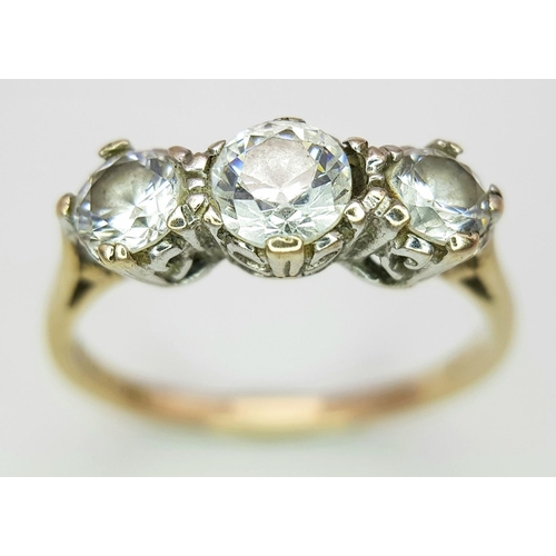 717 - A Vintage 9K Yellow Gold and Three White Stone Ring. Size N. 2.4g total weight.