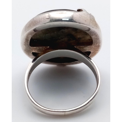 753 - A STYLISH SILVER RING WITH LARGE OBSIDIN STONE ,   14.5gms    size P