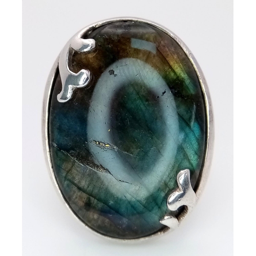 753 - A STYLISH SILVER RING WITH LARGE OBSIDIN STONE ,   14.5gms    size P