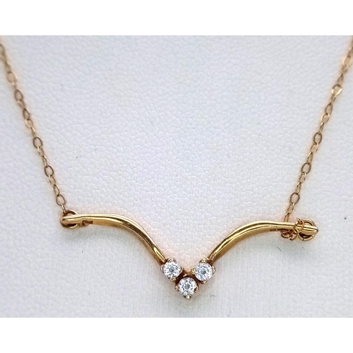 781 - A 9K Gold White Stone Pendant on a 9K Gold Disappearing Necklace. 3cm and 40cm. 1.2g total weight.