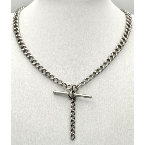 1104 - A silver double Albert watch chain with T-bar and secure links. 52.5cm length and 37g in weight.