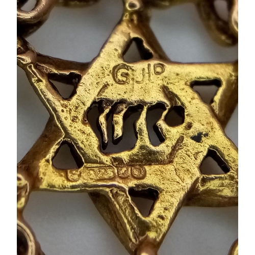 1117 - A 9K Yellow Gold Star of David Pendant. Entwined border. 2cm diameter. 2.6g