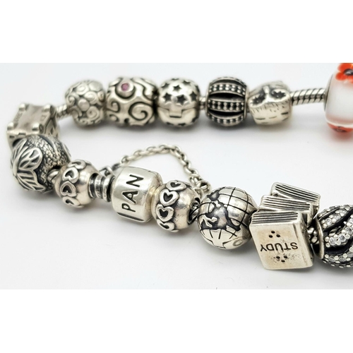 1118 - A Pandora Sterling Silver Charm Bracelet. 18 charms with multiple S25 ALE markings. 16cm. 71g