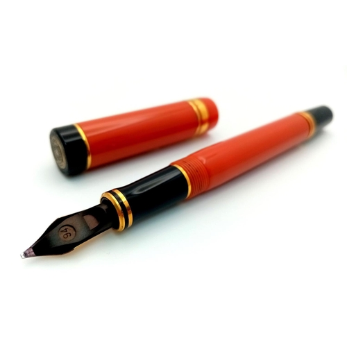 1165 - A Parker Orange Lacquer Fountain Pen. 18k gold nib.