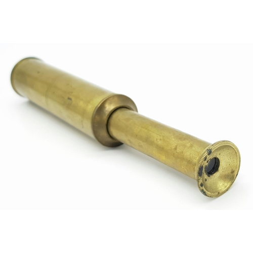 1452 - A compact extendable brass telescope. Weight: 47.1g. Dimensions: 10.3cm (closed), 16.3cm (extended).