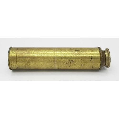 1452 - A compact extendable brass telescope. Weight: 47.1g. Dimensions: 10.3cm (closed), 16.3cm (extended).