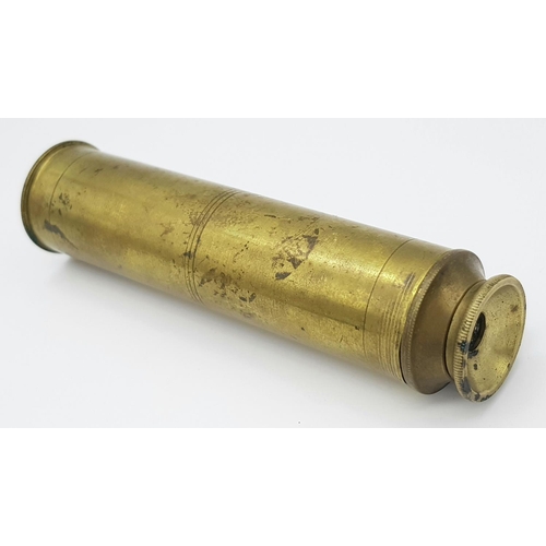 1452 - A compact extendable brass telescope. Weight: 47.1g. Dimensions: 10.3cm (closed), 16.3cm (extended).