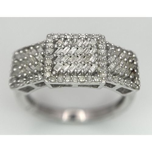 1466 - A 925 silver ring set with diamonds. Ring size O 1/2. Total weight: 3.4g.