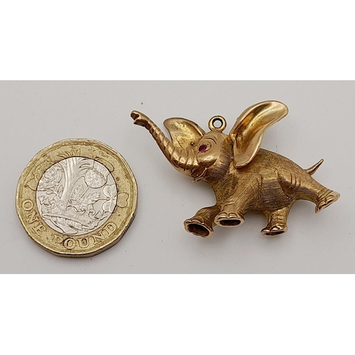 274 - A Wonderful 9K Yellow Gold Elephant Pendant with a Ruby Eye! 4cm. 13.2g