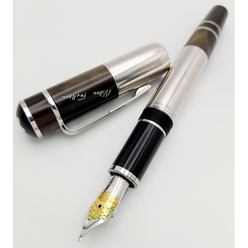 486 - A Montblanc William Faulkner Limited Edition Fountain Pen. 18K gold nib. Dark brown resin and platin... 