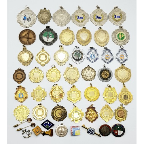 1243 - A mix lot variety of medals, fobs, and badges.