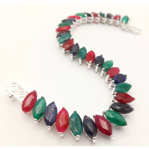 653 - A Ruby, Emerald, Sapphire Marquise Cut Bracelet. Set in 925 Silver. 20cm. CD - 1516