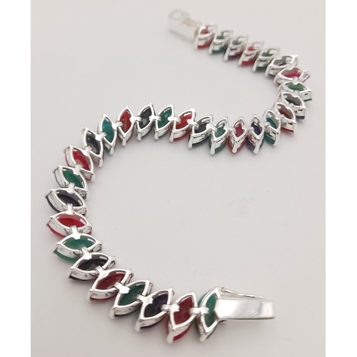 653 - A Ruby, Emerald, Sapphire Marquise Cut Bracelet. Set in 925 Silver. 20cm. CD - 1516