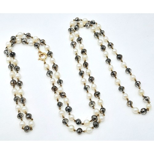 395 - AN 18K GOLD SEED PEARL AND CRYSTAL NECKLACE .   4.8gms    46cms