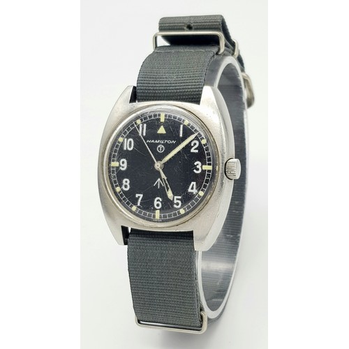 344 - A Vintage Hamilton Military Watch. Textile green strap. Stainless steel case - 36mm. Hand-wind. Mili... 