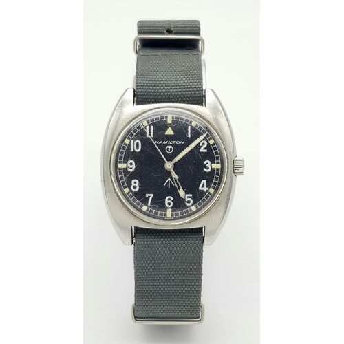 344 - A Vintage Hamilton Military Watch. Textile green strap. Stainless steel case - 36mm. Hand-wind. Mili... 