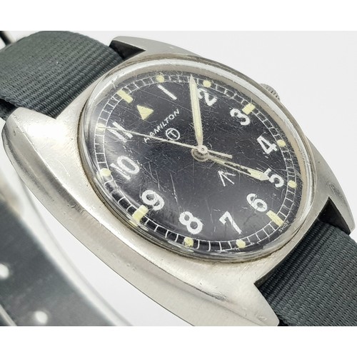 344 - A Vintage Hamilton Military Watch. Textile green strap. Stainless steel case - 36mm. Hand-wind. Mili... 