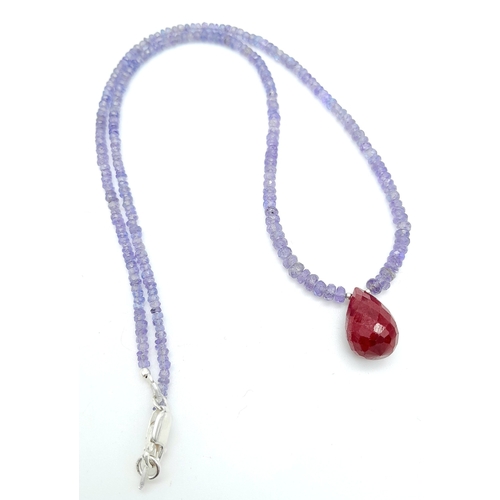 1113 - A 60ctw Tanzanite Single Strand, Ruby Drop Necklace. 925 Silver Clasp. 44cm. Ref: CD-1281