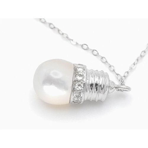 1212 - An 18K White Gold LightBulb Designed Moonstone Pendant! Comes on a delicate 9k white gold necklace. ... 