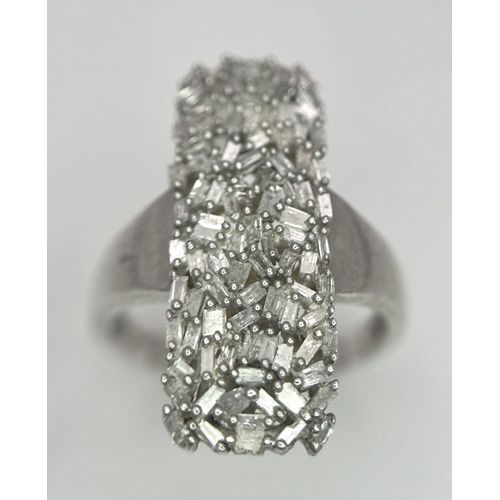 988 - A 925 Silver Diamond Cluster Ring. Elongated shape with pave diamond setting. Size T. 5.5g