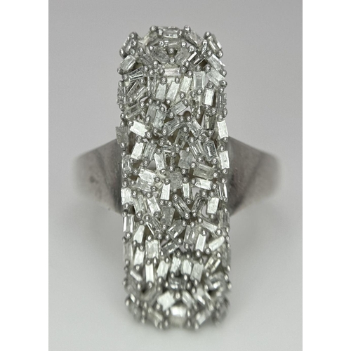 988 - A 925 Silver Diamond Cluster Ring. Elongated shape with pave diamond setting. Size T. 5.5g