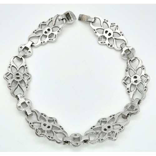 792 - An Art Deco Platinum and Diamond Bracelet. Old cut diamonds - 3ctw. 17.3g total weight. 18cm length.