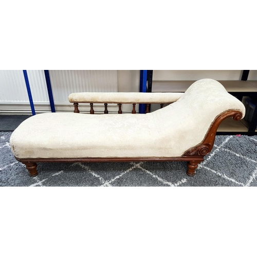 1443 - An Antique Mahogany Chaise Longue with Cream Embroidered Upholstery. 180cm. Please see photos for co... 