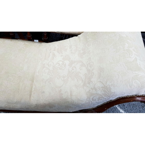 1443 - An Antique Mahogany Chaise Longue with Cream Embroidered Upholstery. 180cm. Please see photos for co... 