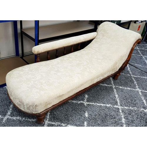 1443 - An Antique Mahogany Chaise Longue with Cream Embroidered Upholstery. 180cm. Please see photos for co... 