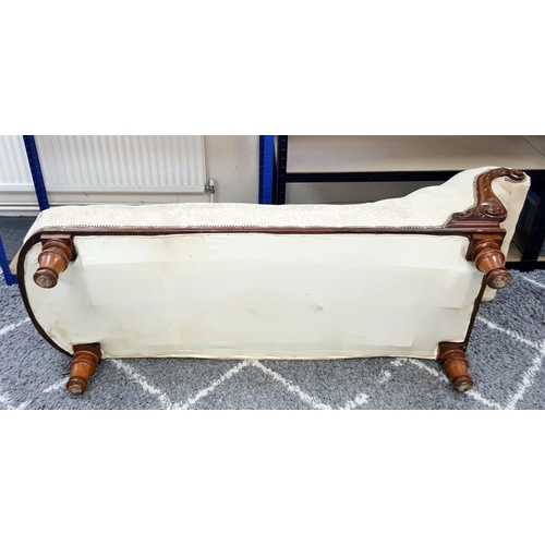 1443 - An Antique Mahogany Chaise Longue with Cream Embroidered Upholstery. 180cm. Please see photos for co... 