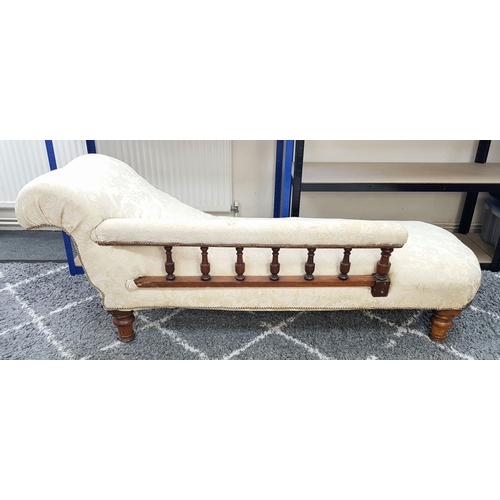 1443 - An Antique Mahogany Chaise Longue with Cream Embroidered Upholstery. 180cm. Please see photos for co... 