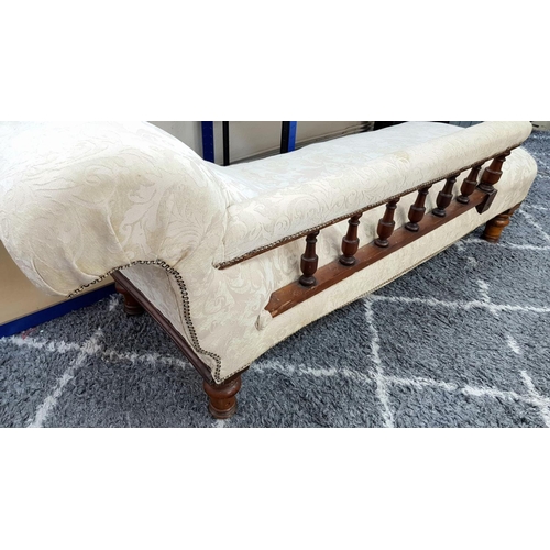 1443 - An Antique Mahogany Chaise Longue with Cream Embroidered Upholstery. 180cm. Please see photos for co... 