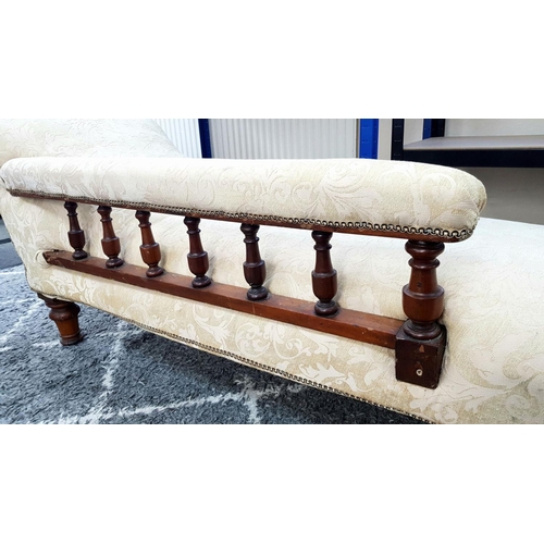 1443 - An Antique Mahogany Chaise Longue with Cream Embroidered Upholstery. 180cm. Please see photos for co... 