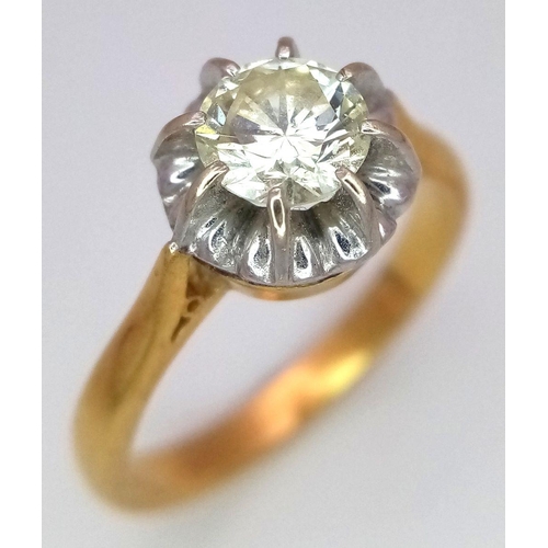 197 - A Vintage 18K Yellow Gold (tested) Diamond Solitaire Ring. 
0.90ct brilliant round cut diamond. Size... 